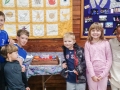 children with church 200th cake