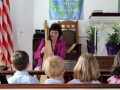 children enjoy JoAnne's harp music