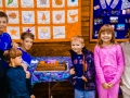 The next generation of Copper Hill folks stand up with the 200th Anniversary cake