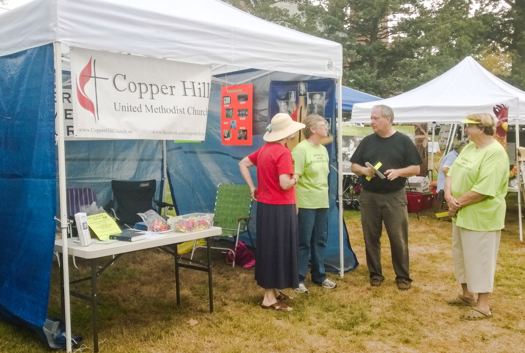 An informal chat by our booth on Saturday at Suffield on the Green