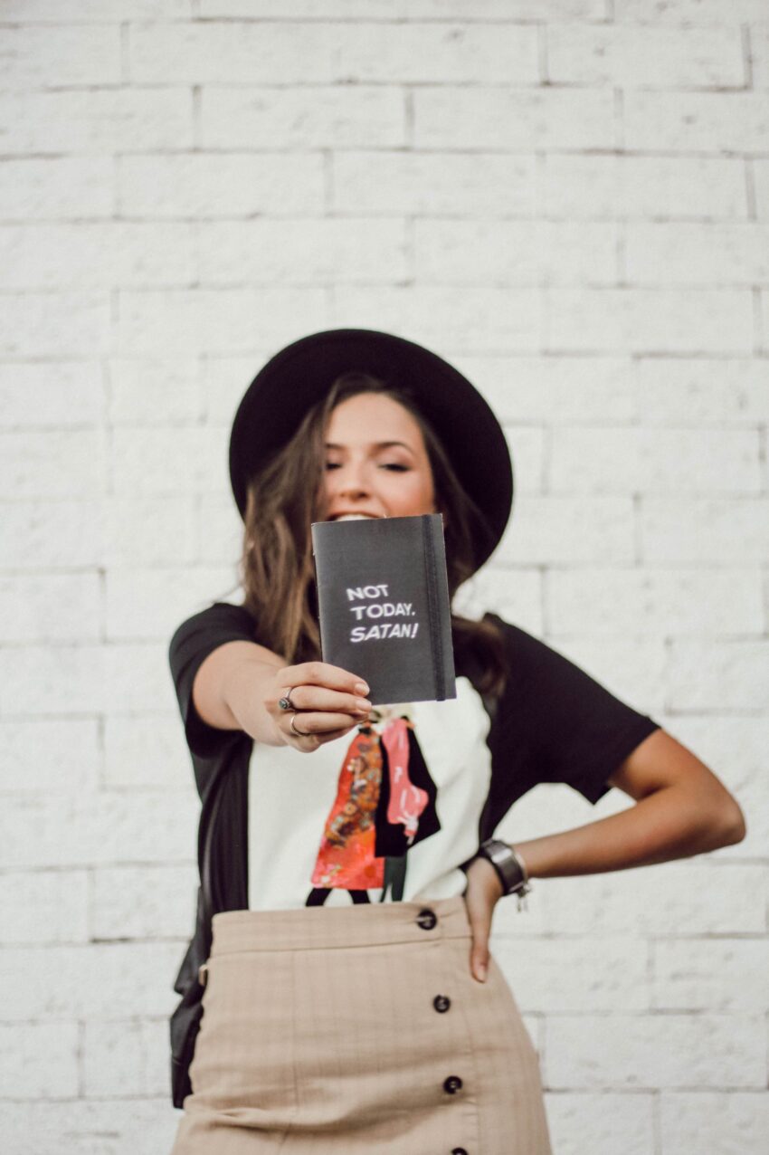 girl holding message of personal triumph