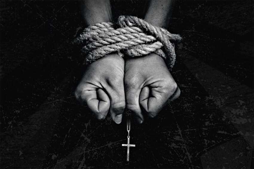 bound hands with cross