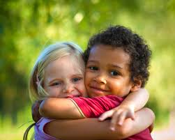 children of different races hugging