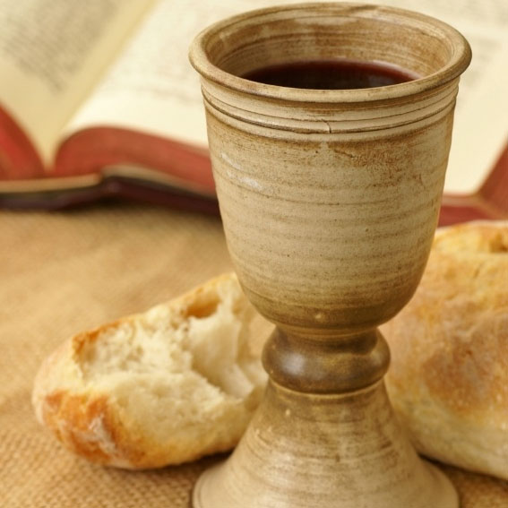 Communion Cup with bread and Bible