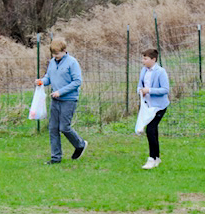 Friends collecting Easter eggs
