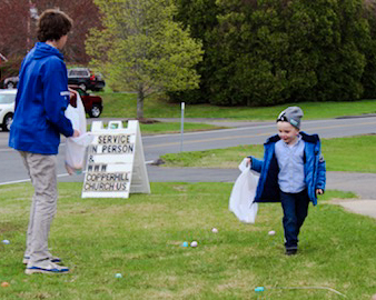 Cousins collecting Easter eggs