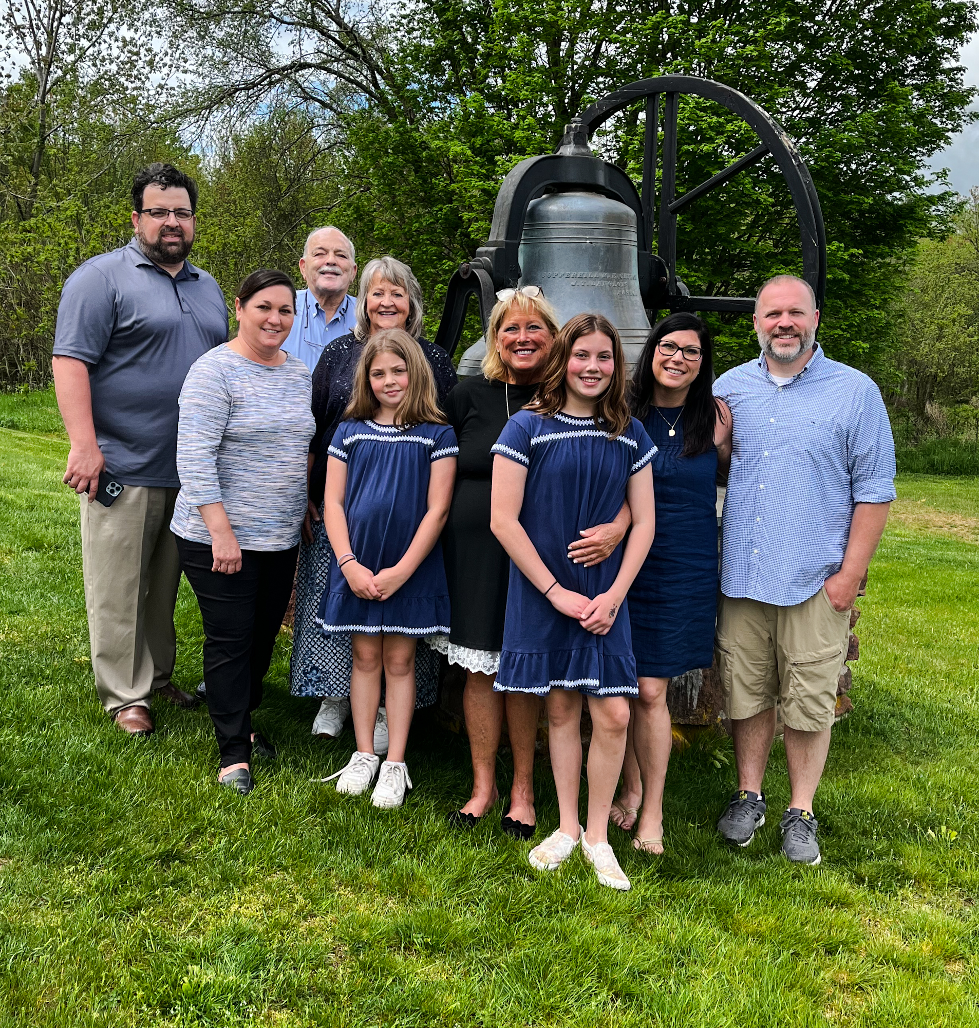 Madison and her extended family by Copper Hill Church bell